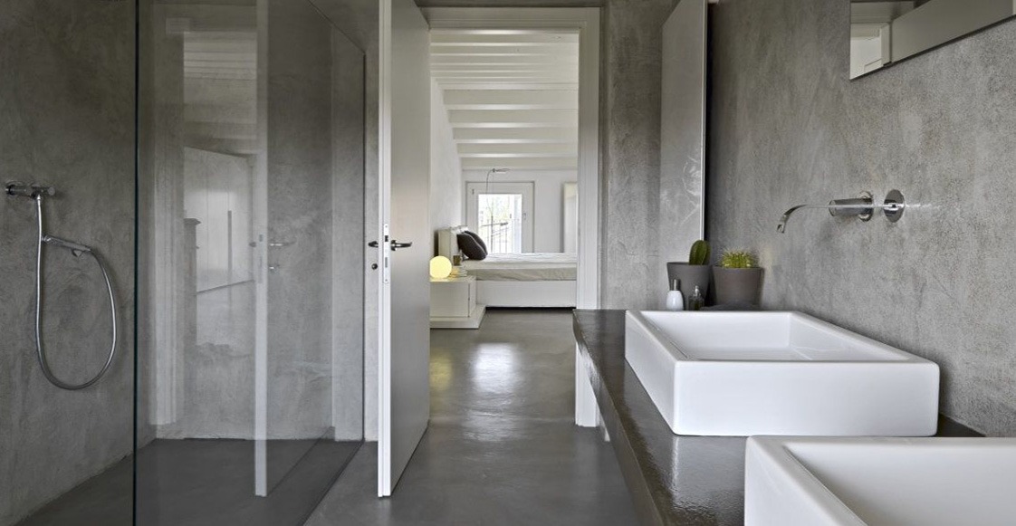 Microcemento en baños: elegancia continua y funcionalidad sin límites